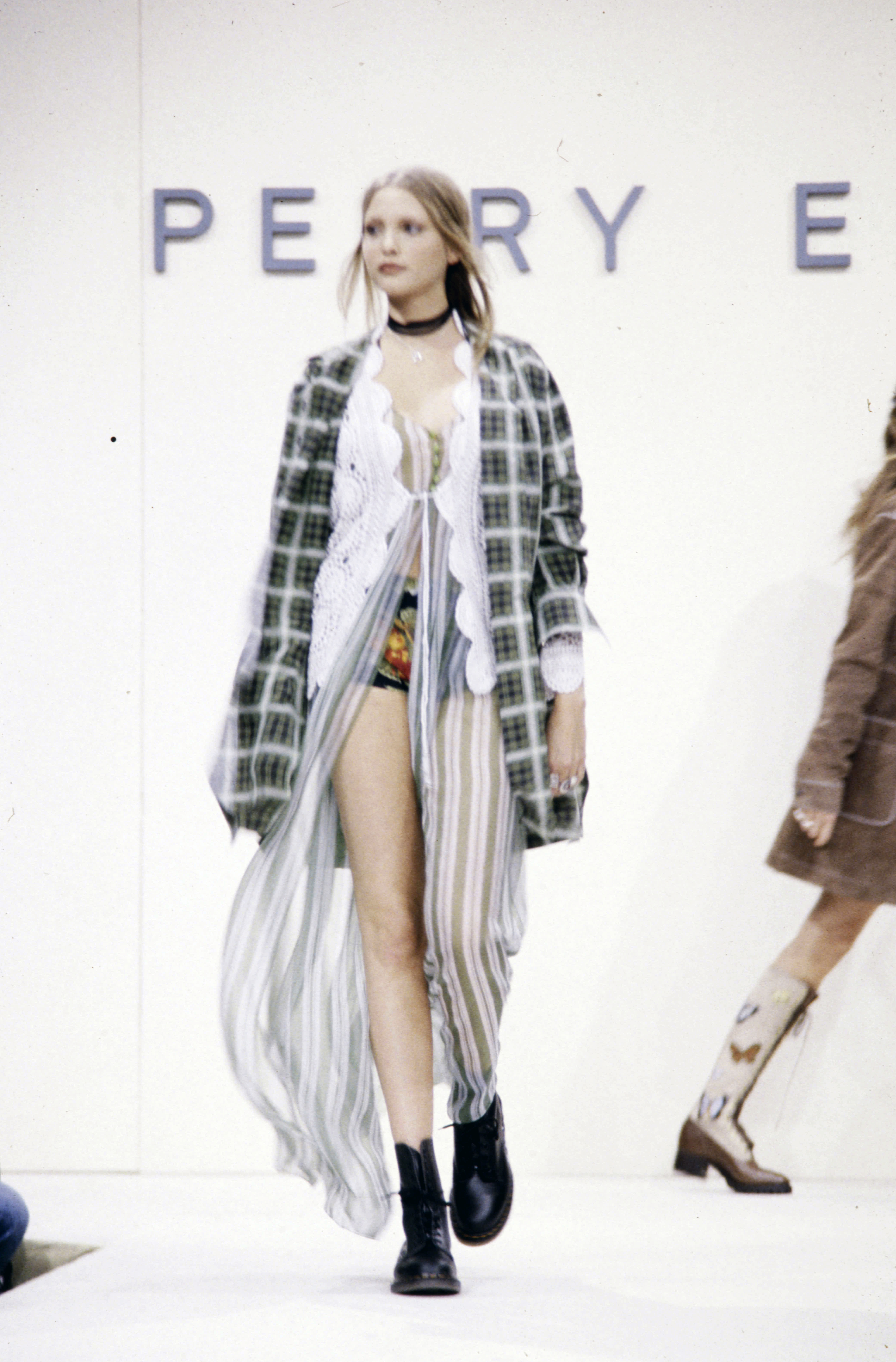 An image of plaid shirts on Perry Ellis&#039; SS93 runway.