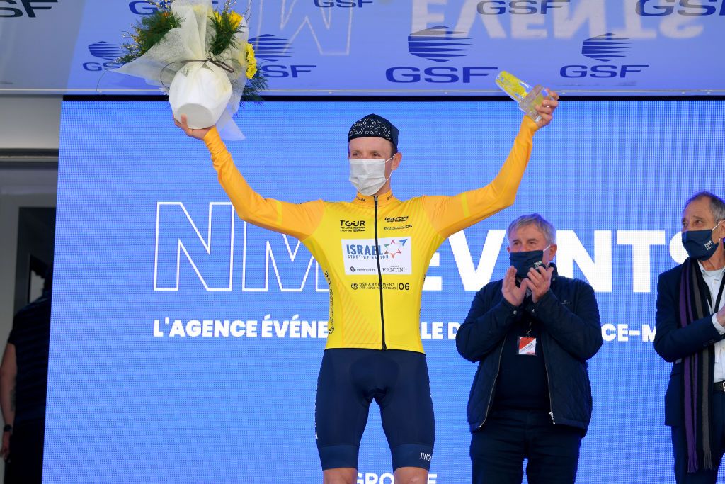 FAYENCE FRANCE FEBRUARY 20 Podium Michael Woods of Canada and Team Israel StartUp Nation Yellow Leader Jersey celebrate during the 53rd Tour Des Alpes Maritimes Et Du Var Stage 2 a 1689km stage from Fayence to Fayence 357m Trophy letour0683 on February 20 2021 in Fayence France Photo by Luc ClaessenGetty Images