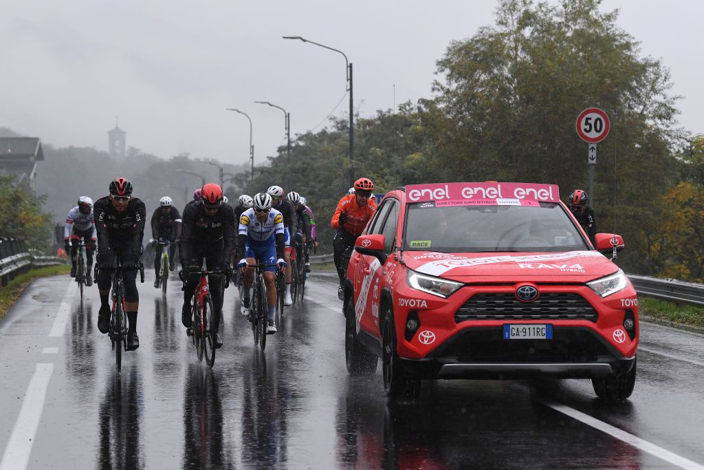 ASTI ITALY OCTOBER 23 Filippo Ganna of Italy and Team INEOS Grenadiers Davide Ballerini of Italy and Team Deceuninck QuickStep Josef Cerny of Czech Republic and CCC Team Race neutralised due to heavy rain and team riders protest during the 103rd Giro dItalia 2020 Stage 19 a 258km stage from Morbegno to Asti girodiitalia Giro on October 23 2020 in Asti Italy Photo by Tim de WaeleGetty Images