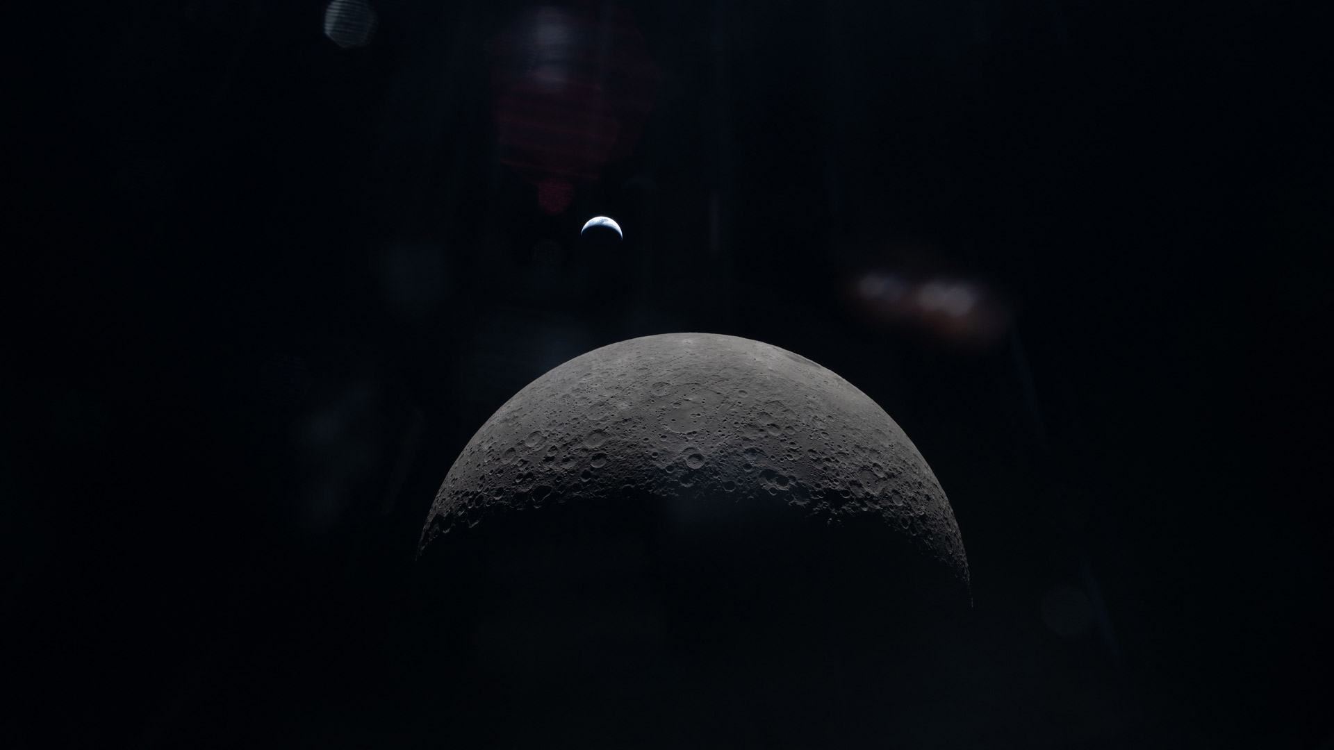 art002e015231 (April 6, 2026) &amp;ndash; The Artemis II crew captures a faint view of a crescent Earth above the horizon on the Moon&amp;rsquo;s far side.