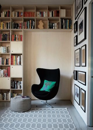 A reading corner with bookshelves