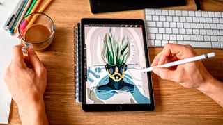 An artist shows how to draw on the iPad
