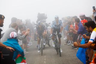 PAJARES SPAIN SEPTEMBER 01 LR Primoz Roglic of Slovenia and Team Red Bull Bora hansgrohe and Enric Mas of Spain and Team Movistar compete in the chase group during the La Vuelta 79th Tour of Spain 2024 Day 15 a 143km stage from Infiesto to ValgrandePajares Cuitu Negru 1835m UCIWT on September 01 2024 in Pajares Spain Photo by Luis Gomez PoolGetty Images