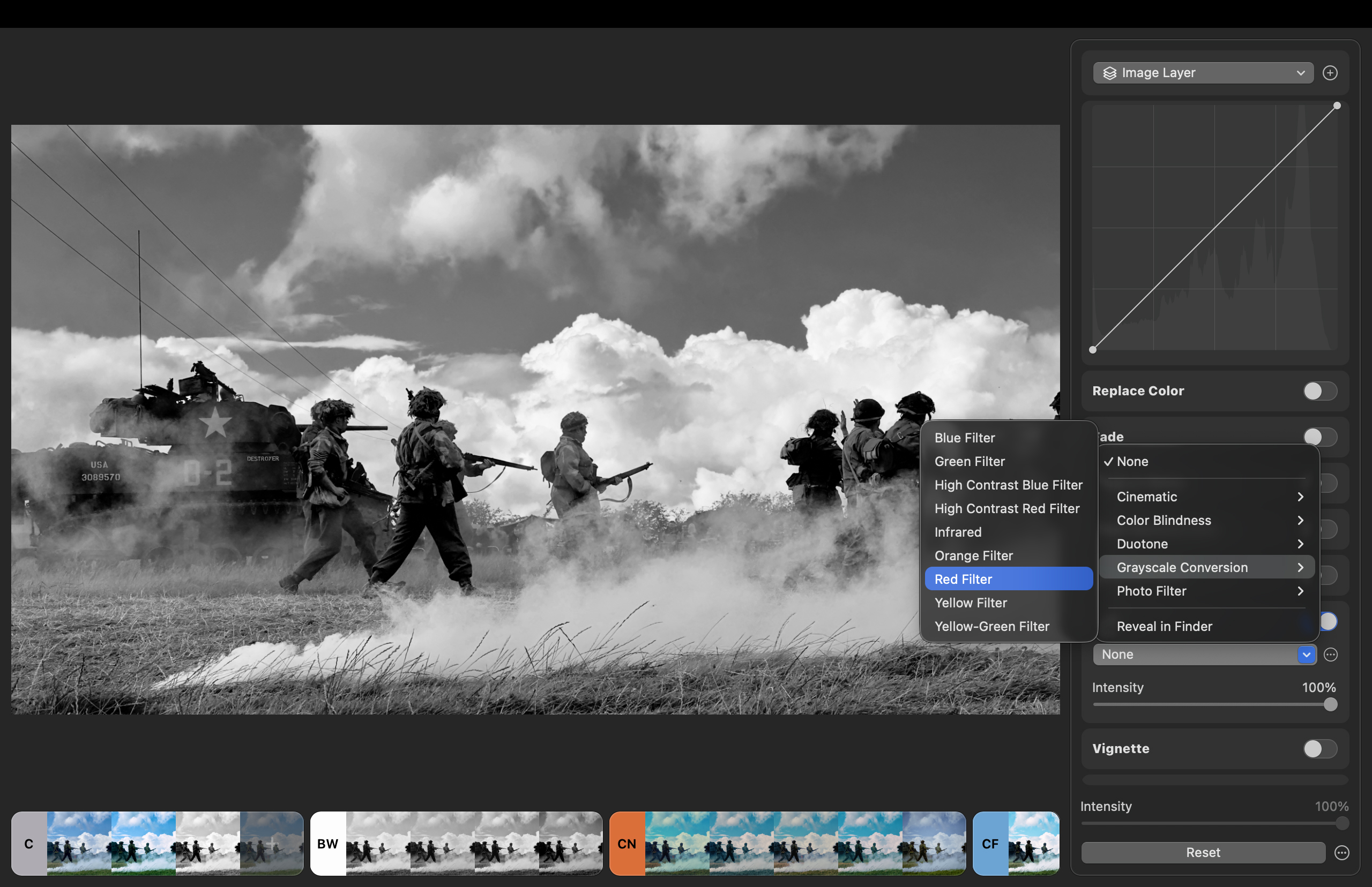 Shot of World War II reenactors and a tank on a battlefield. A Red LUT has been applied from the Grayscale Conversion selection of LUTs.