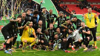 Manchester City celebrate their victory over Aston Villa in the Carabao Cup final