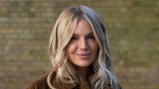 Sienna Miller wearing Barbour trench coat at London Fashion Week on 17 September, 2026