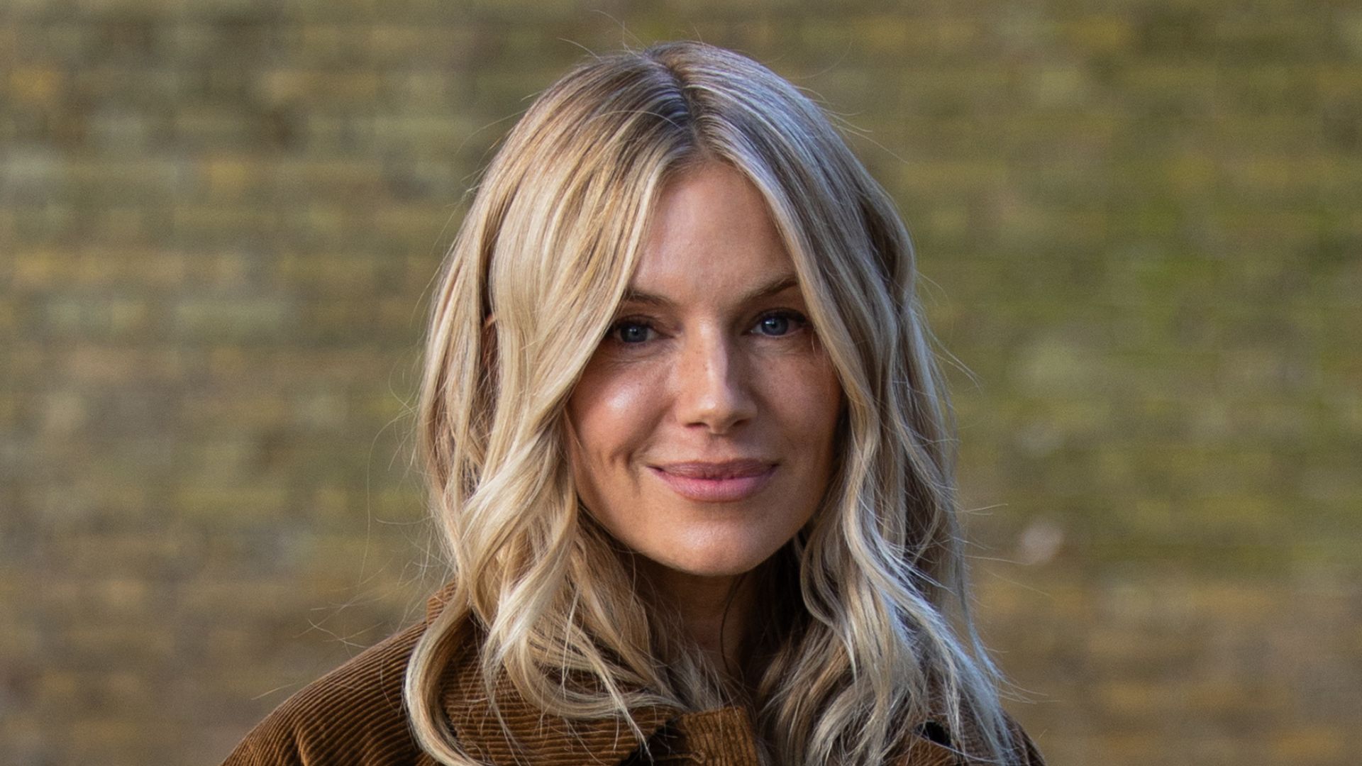 Sienna Miller wearing Barbour trench coat at London Fashion Week on 17 September, 2026