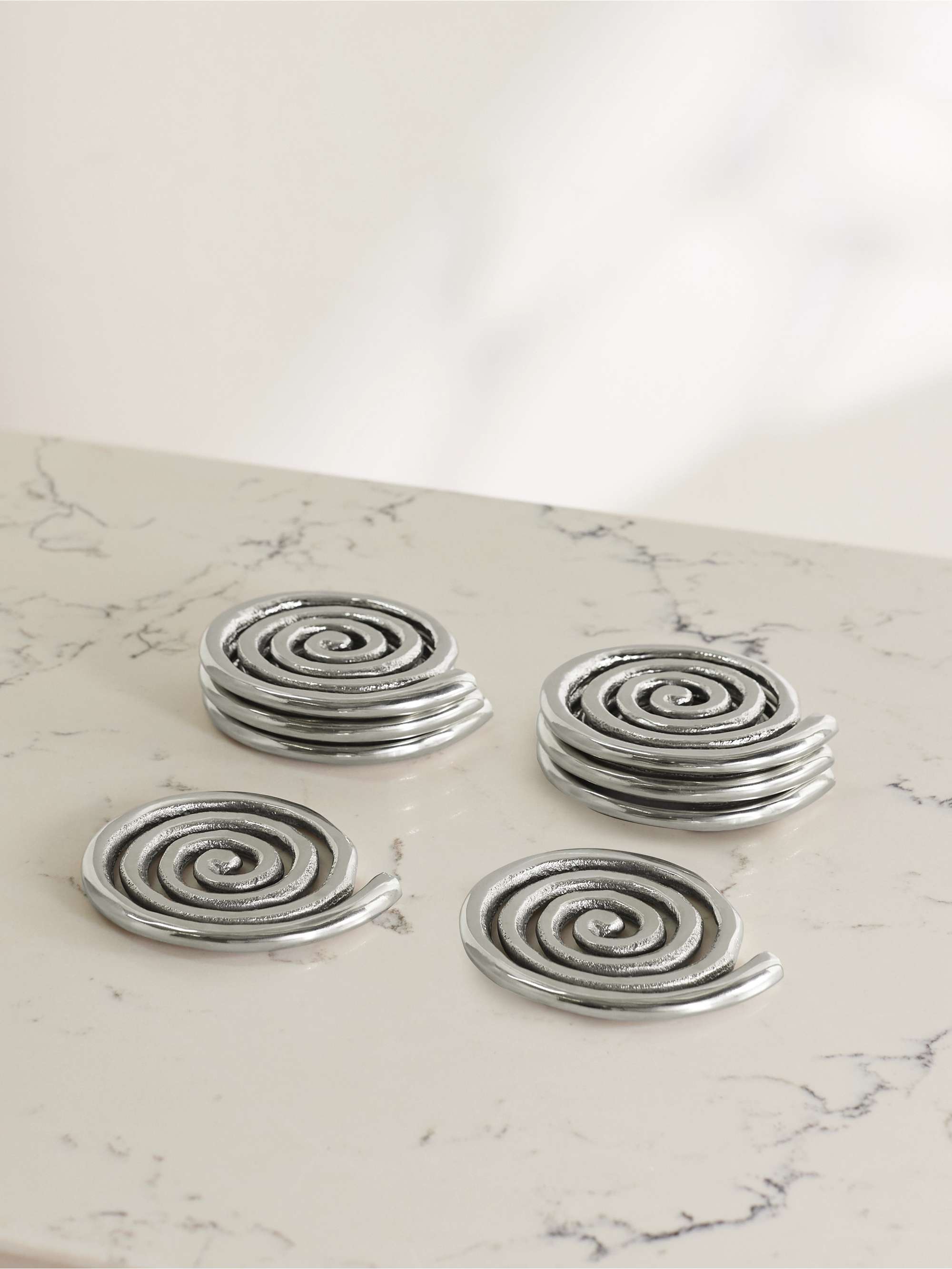 + Etagere Spiral Set of Eight Nickel-Plated Coasters