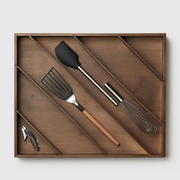 Diagonal In-Drawer Organizer | $49.99
This sleek divider will ensure that nobody ever mistakes your utensil drawer for the junk drawer again.&nbsp;