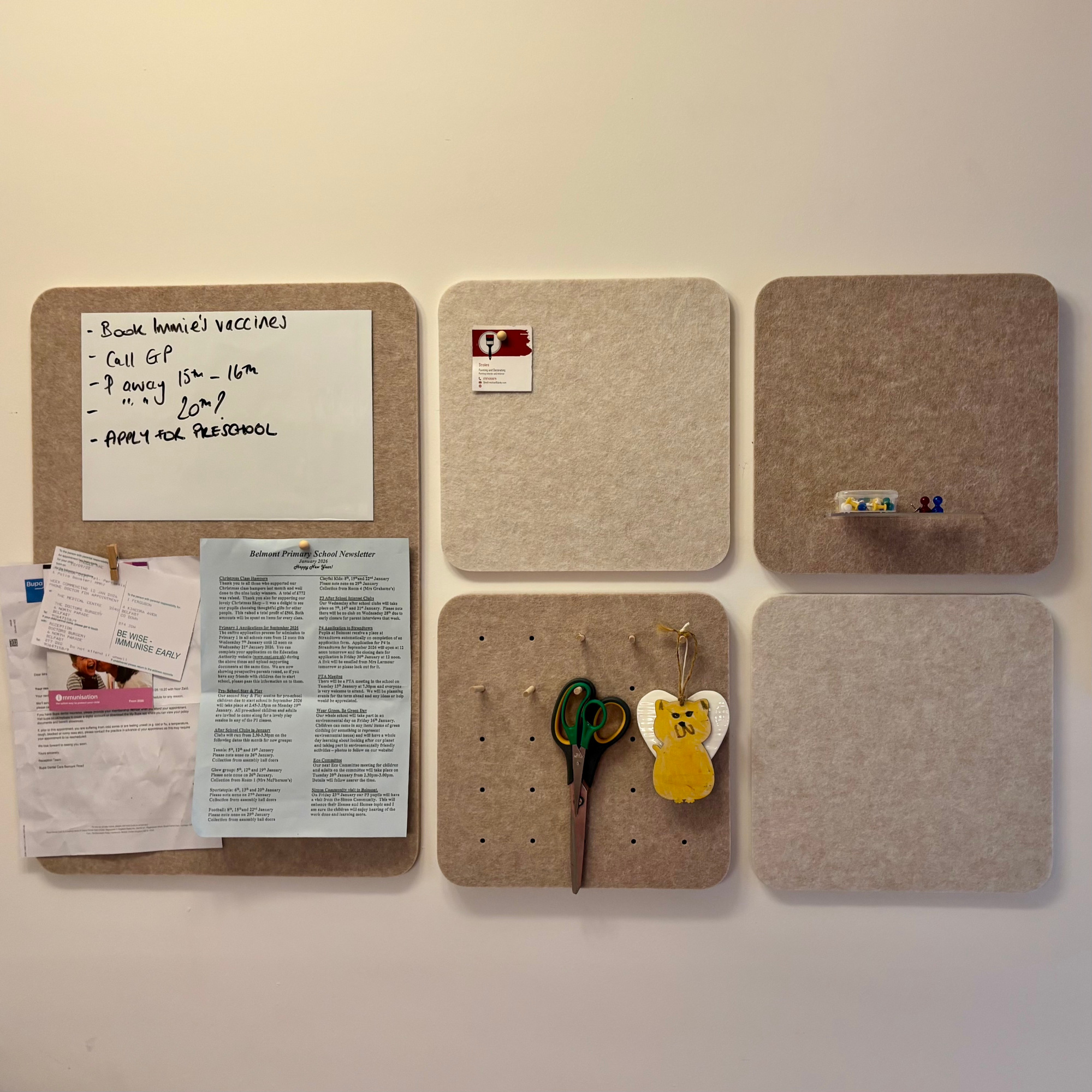 pinboards on a wall with letters, scissors and whiteboard