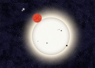 In this family portrait of the PH1 planetary system, the newly discovered planet is depicted in this artist's rendition transiting the larger of the two eclipsing stars it orbits. Off in the distance, well beyond the planet orbit, resides a second pair of stars bound to the planetary system. Released Oct. 15, 2012.