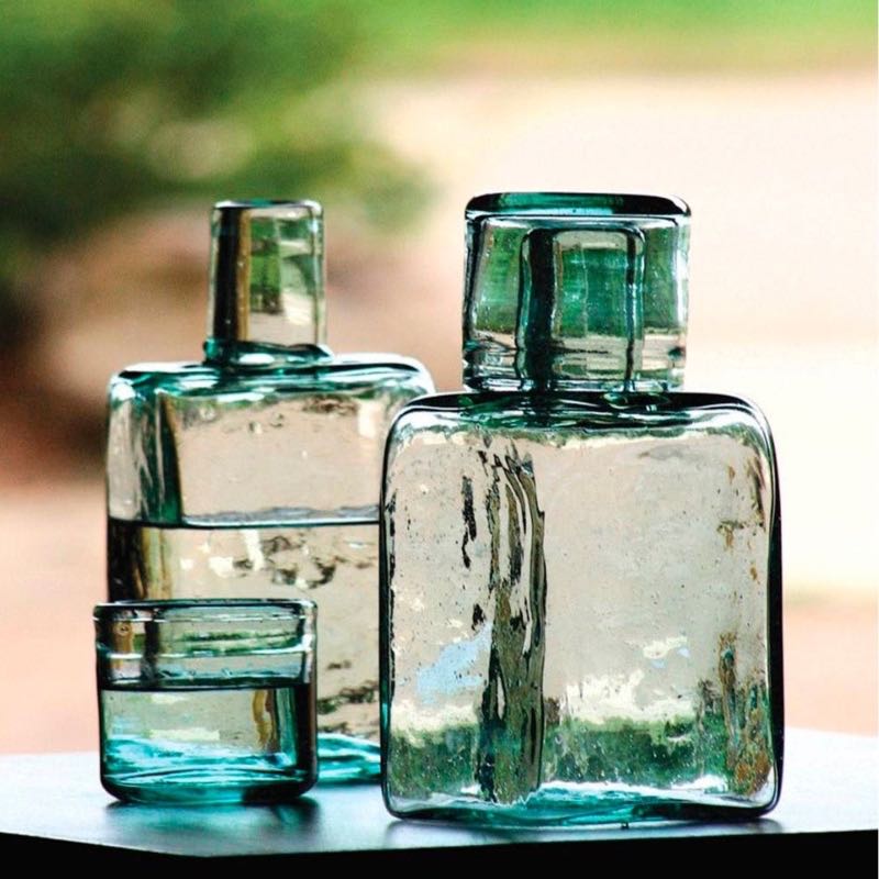 A recycled glass carafe and drinking glass set from Viva Terra