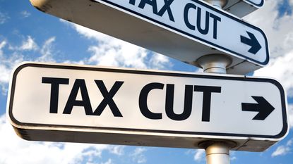 picture of tax cuts signs with arrows for income tax story