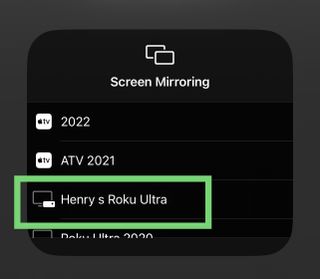 The iPhone's screen mirroring menu has a Roku device highlighted in green, one of the many ways to enable Roku screen mirroring