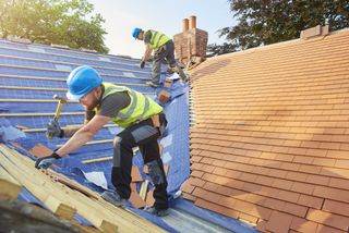 roofers installing new roof