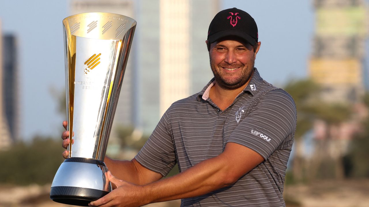 Peter Uihlein with the International Series Qatar trophy