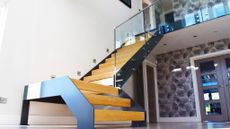 How to design a staircase: Model 500 staircase with oak treads and steel stringers from Complete Stair Systems