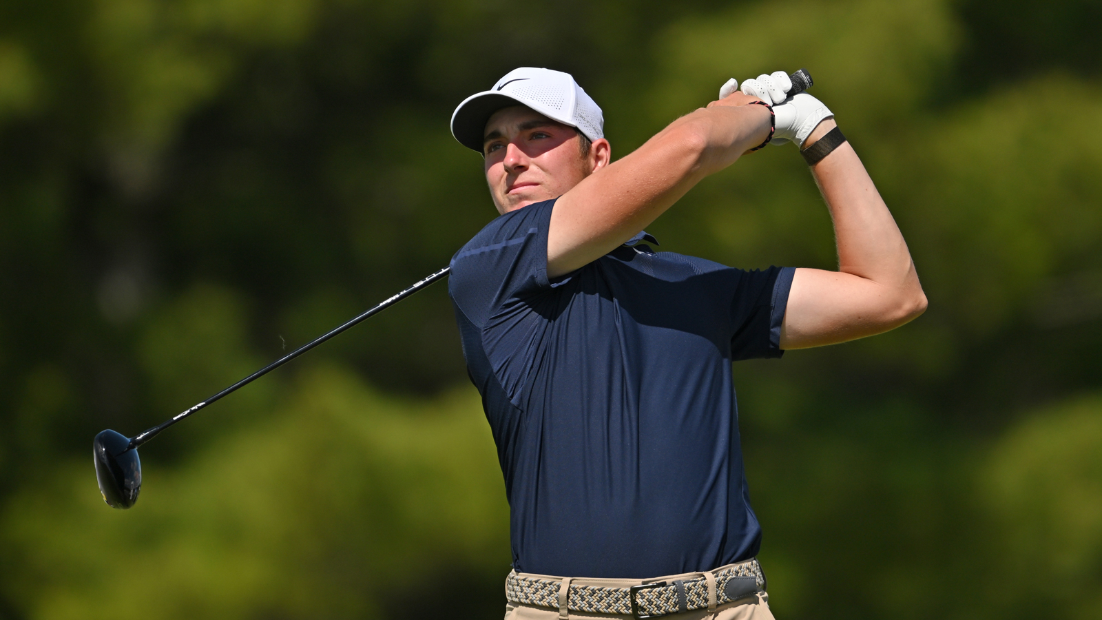 Ben James hits a driver off the tee