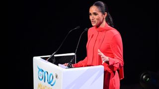 Meghan, Duchess of Sussex gestures as she delivers a speech on stage during the annual One Young World Summit at Bridgewater Hall in Manchester, north-west England on September 5, 2022.