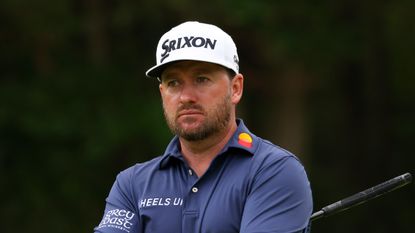 Graeme McDowell poses on putting green