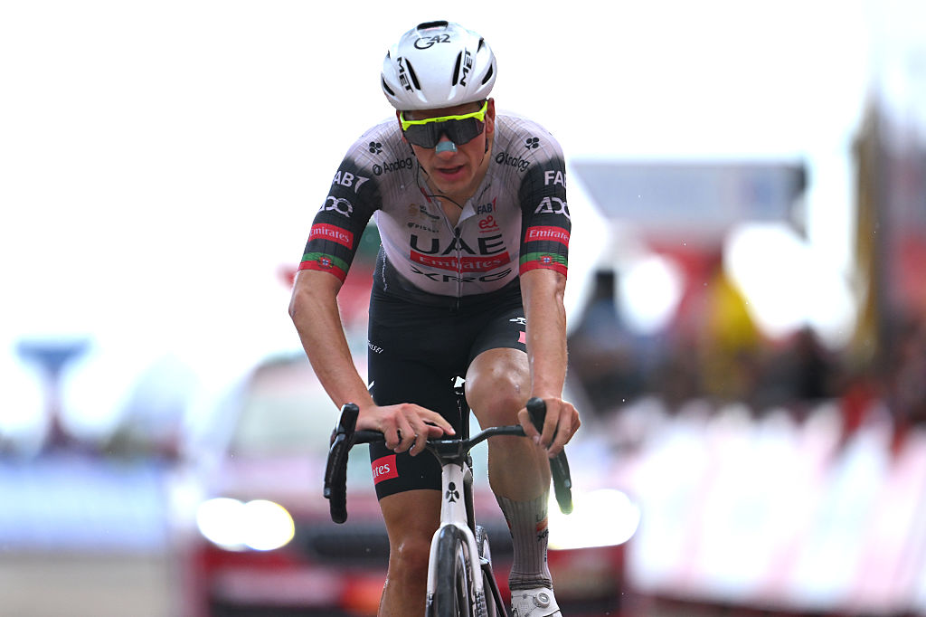 ALFARO, SPAIN - AUGUST 31: Joao Almeida of Portugal and UAE Team Emirates - XRG crosses the finish line as third place winner during the La Vuelta - 80th Tour of Spain 2025, Stage 9 a 195.5km stage from Alfaro to Estacion de Esqui de Valdezcaray 1541m / #UCIWT / on August 31, 2025 in Alfaro, Spain. (Photo by Tim de Waele/Getty Images)