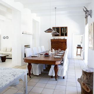 white walls with dinning table and chair