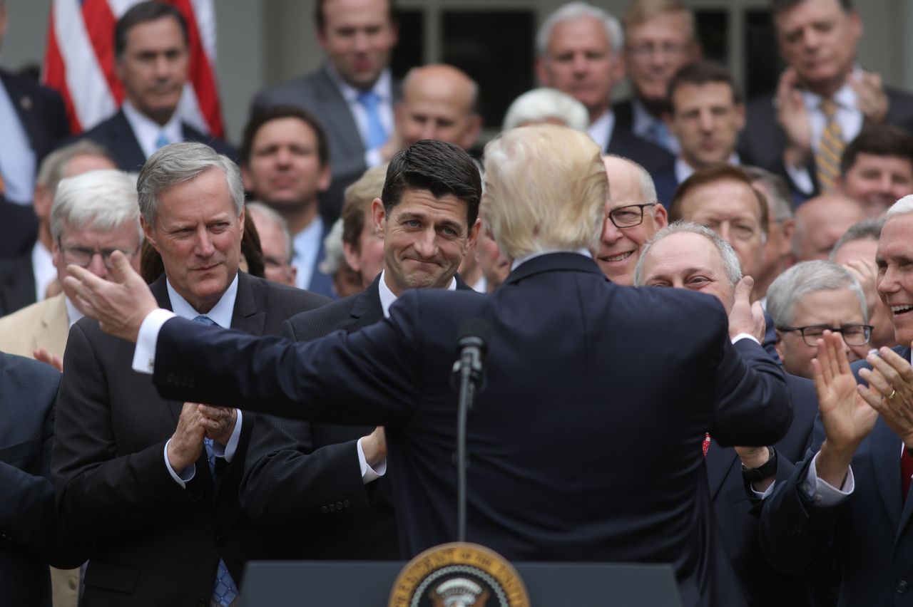 President Trump goes in to hug Paul Ryan.