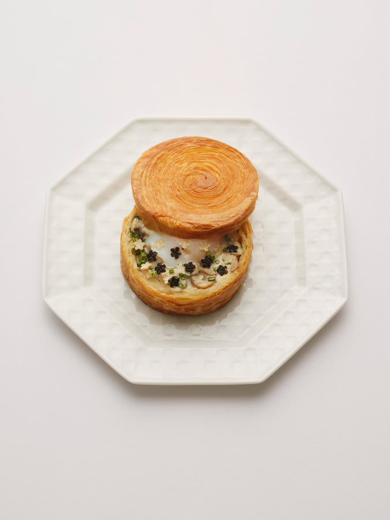 view of some of the dishes at monsieur dior restaurant by mauro colagreco