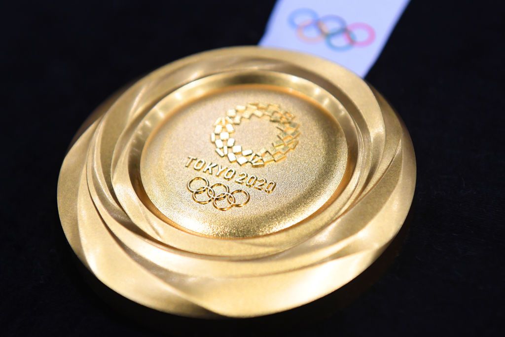 Olympic officials will replace Japanese athlete's gold medal after mayor  bit it