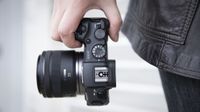 Canon EOS RP being held outdoors
