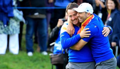 Graeme McDowell and Sergio Garcia hug at the Ryder Cup