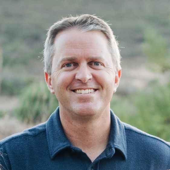 Smiling headshot of Andy Darcy.