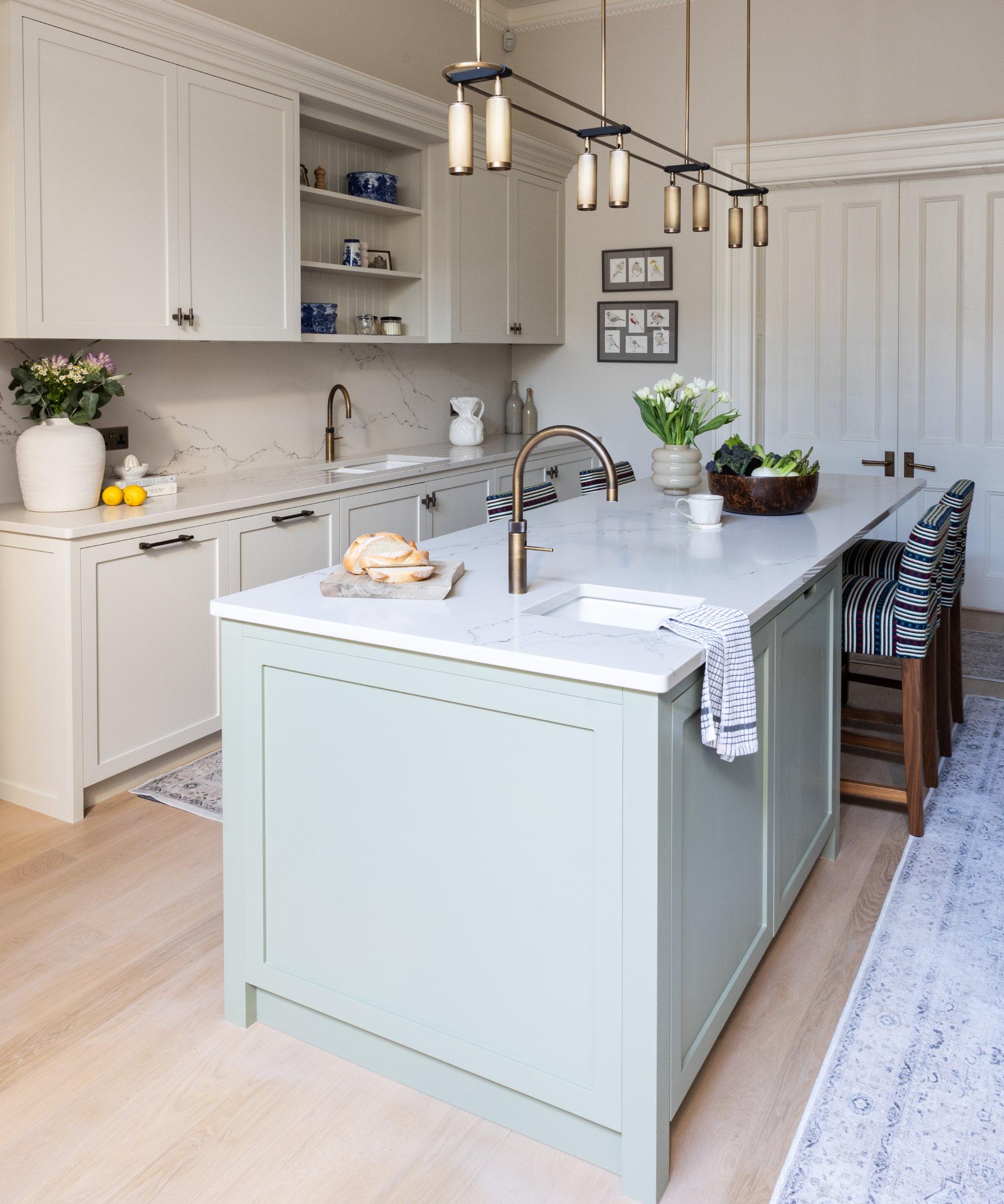 off white kitchen with pale blue kitchen island