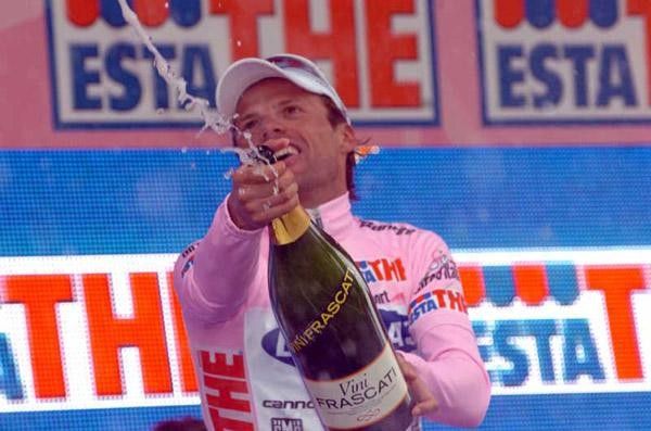 Di Luca cracks the champagne on another day in pink