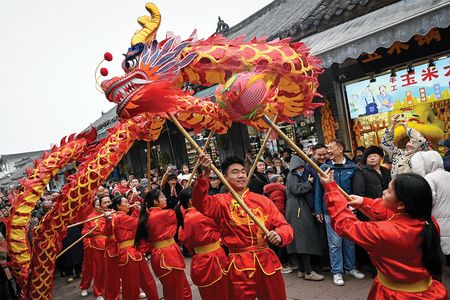 Chinese dragon dance team performing