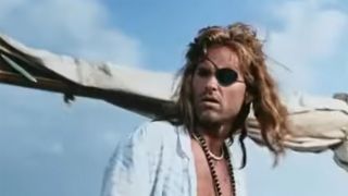 Kurt Russell Wearing an eye patch in Captain Ron