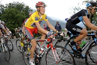 Janez Brajkovic (Team RadioShack) leads Alberto Contador (Astana) rides in the peloton on the final stage of the Critérium du Dauphiné