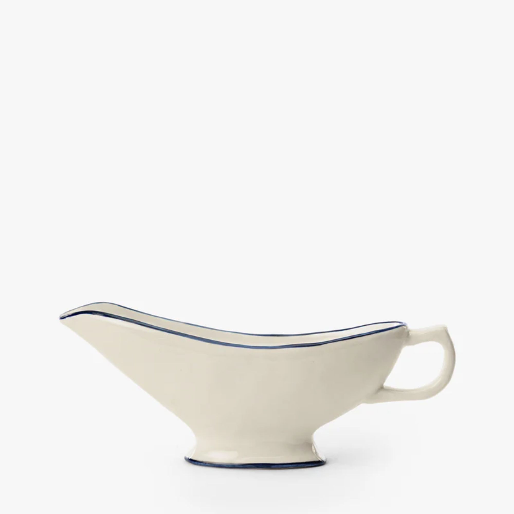 Cream gravy boat with navy rim