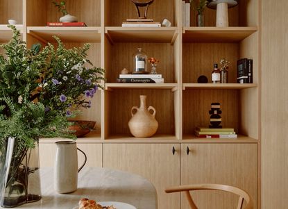 A bespoke bookshelf that fits flush against the wall