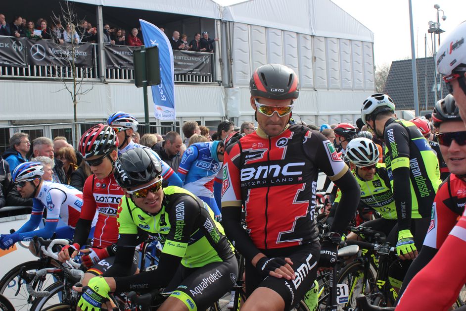 Greg Van Avermaet looks at a Trek-Segafredo rider's bike and says "It looks like shit"
