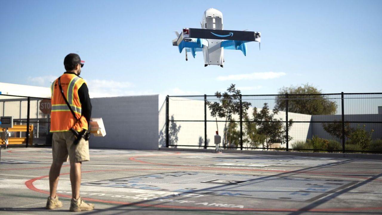 Image of Amazon's MK30 delivery drone taking off from a Same-Day delivery hub.