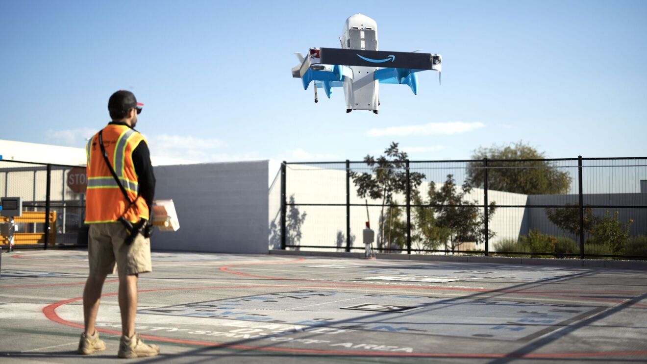 Image of Amazon's MK30 delivery drone taking off from a Same-Day delivery hub.