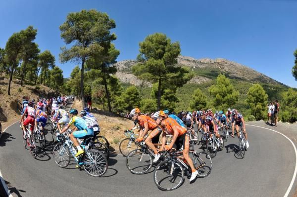 The peloton rounds a bend on stage 11.