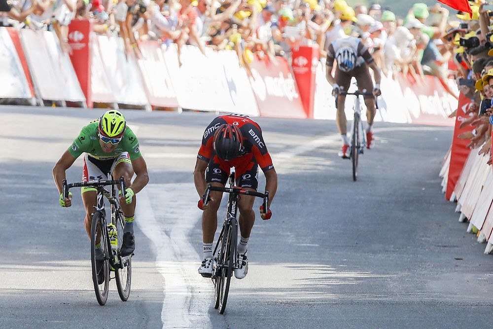Greg Van Avermaet (BMC) beats Peter Sagan (Tinkoff-Saxo) to the finish line