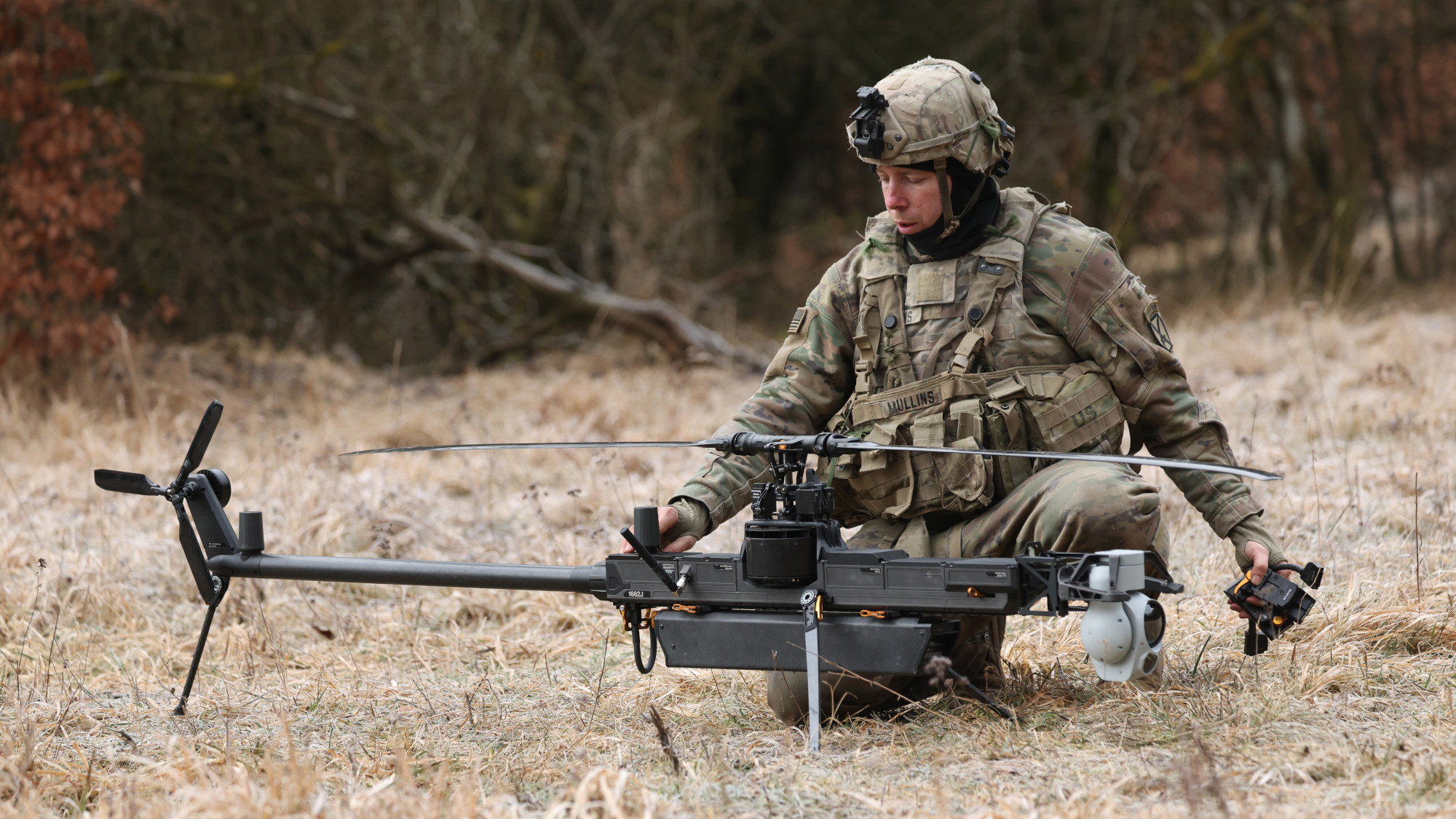 A soldier readies an Anduril Ghost-X drone.