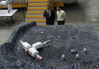 Space entrepreneur, Robert Bigelow (left) explains company’s plans for commercial operations on the moon.