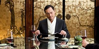 Ken Watanabe as Mr. Saito at a dinner in Inception.