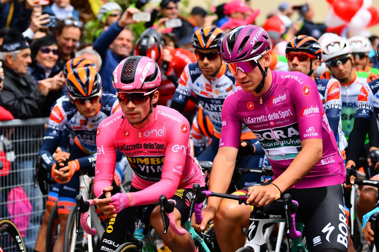 Primoz Roglic (Jumbo-Visma) and Pascal Ackermann (Bora-Hansgrohe) wait for the start