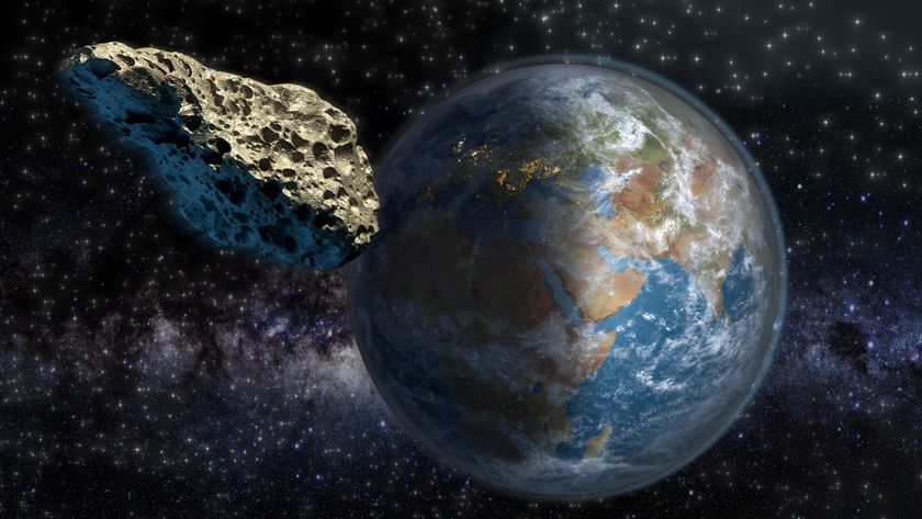 An artist&#039;s illustration of an asteroid passing Earth at a large distance