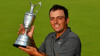 Francesco Molinari celebrates with the Claret Jug after winning The Open at Carnoustie in 2018
